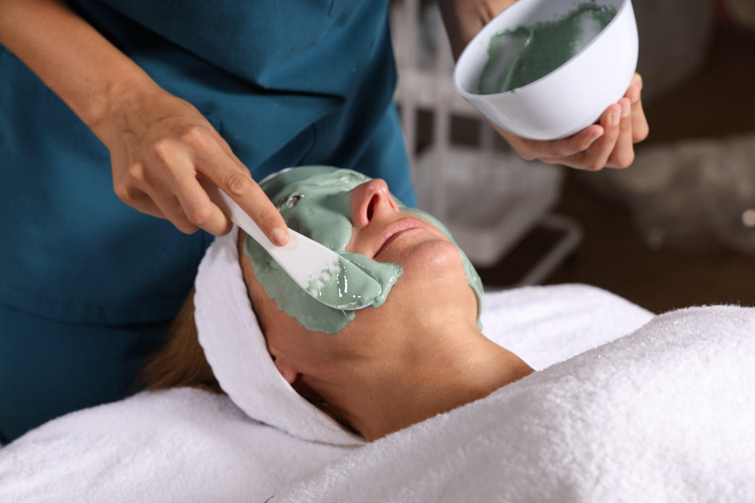 A relaxed lady having the Live probiotic ampoule and exclusion mask applied as part of the Esse Live Probiotic Experience Facial at the Eleanor Olsen Facial Clinic in Surrey
